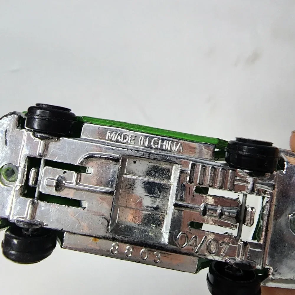 MERCEDES-BENZ 500 SEC  number 8803 can be found on inside Green Race Car #55